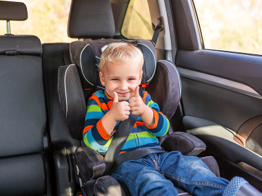 Boy in car seat