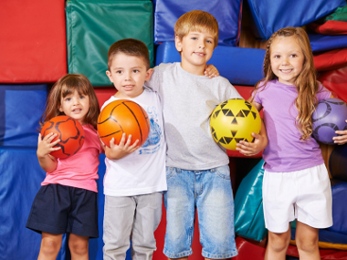 Children with sports ball