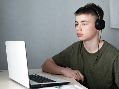 Teenage boy on laptop