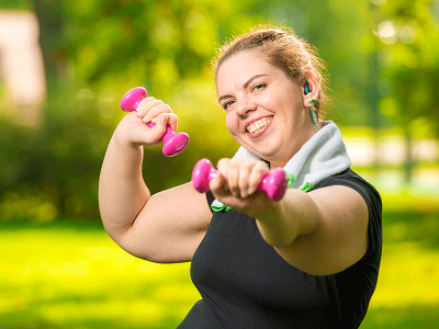 Happy woman exercising