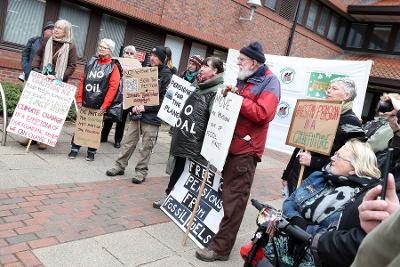 Divest placards