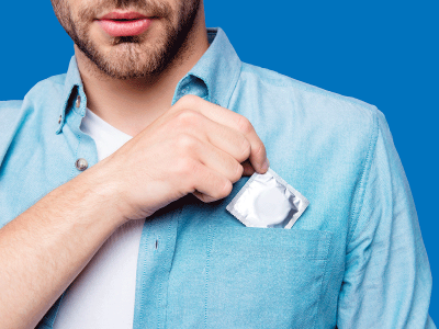 man with a condom in his shirt pocket